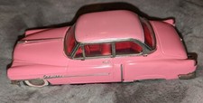 De Luxe Friction 1950 Pink Cadillac MF330 Pressed Metal Toy Car