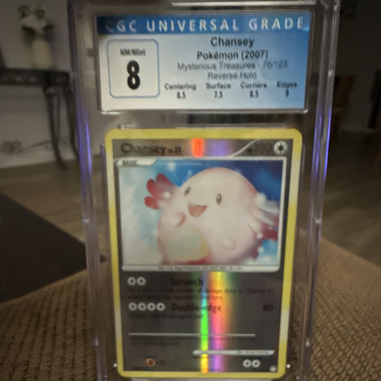 Pokemon Chansey 76/123 Mysterious Treasures Reverse Holo CGC 8 ENG 2007