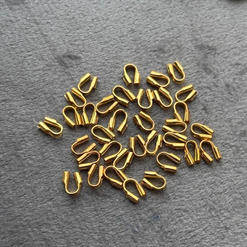 Protector de cubierta de alambre de oro amarillo macizo de 14 k con cuerdas 0,6 mm 10 piezas Foto 3 de 3