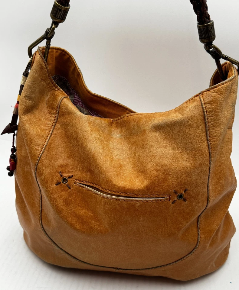 Bolso de hombro The Sak para mujer de cuero marrón con bolsillo interior con asa trenzada Foto 2 de 4