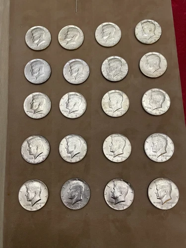 Twenty 1967 Kennedy Half Dollars Uncirculated and about uncirculated (40% silver