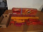 PARTIAL TRACK ACTION SET. NO CARS HAS PEGS PLUS OTHER PIECES U CAN ZOOM IN