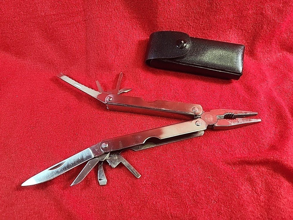 12-in-1 Multi-Tool Kit with Pliers, Knife, Bottle Opener & Ruler in Case  