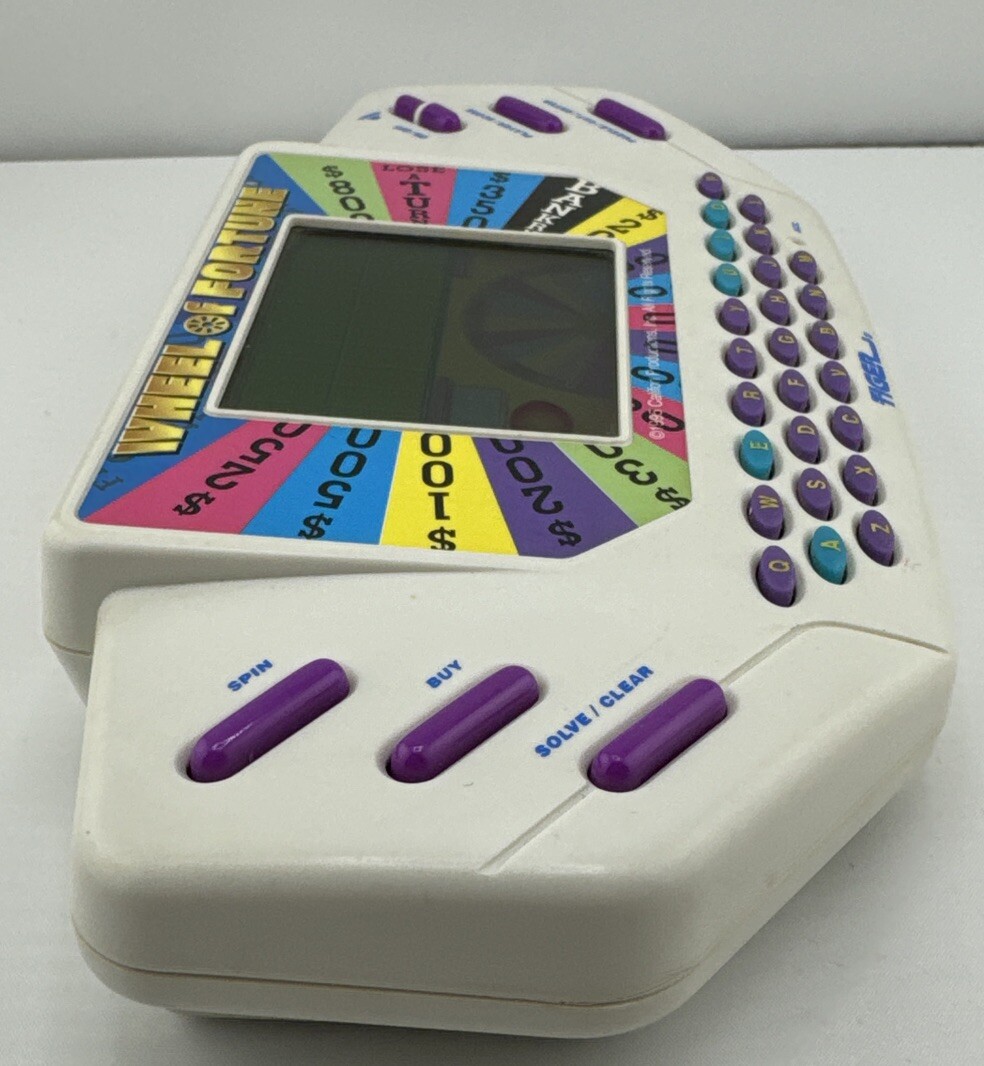 TIGER Wheel of Fortune Handheld Electronic Game with Cartridge Tested