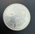 1884 O BRILLIANT UNCIRCULATED MORGAN SILVER DOLLAR