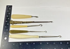 Collection of Antique Button Boot Hooks and a Manicure
