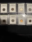 Lot Of 8 International Numismatic Bureau Slabs Of Pennies And Nickels.