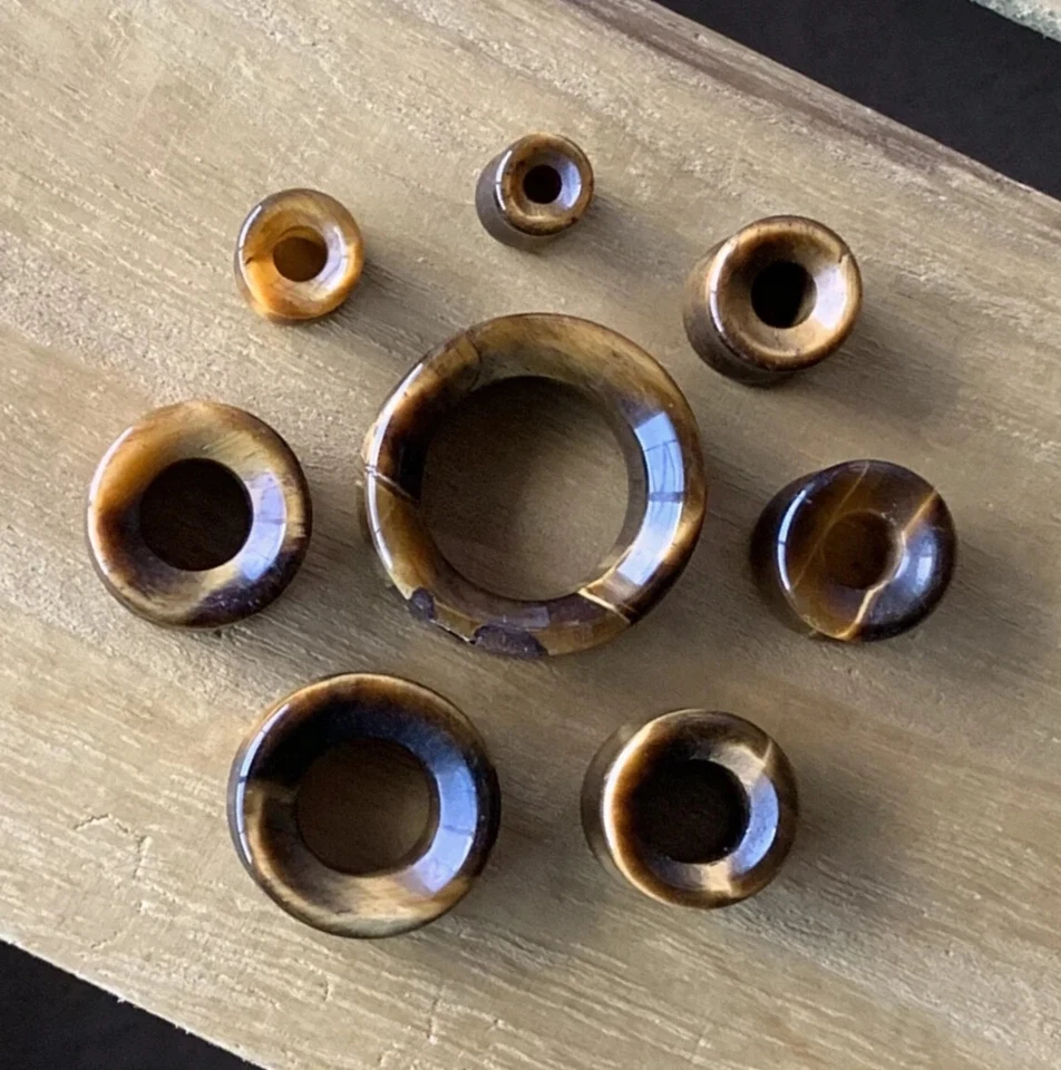 PAR de túneles de piedra orgánica ojo de tigre tapones de doble llamarada medidores de orejas Foto 3 de 4