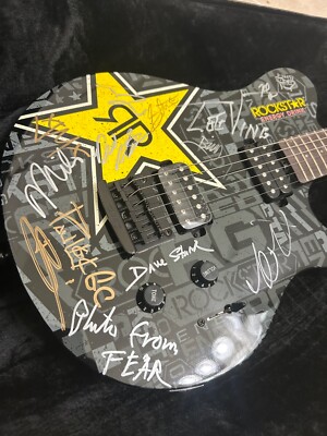 Signed Rockstar energy Branded STERLING MUSIC MAN AX20 Electric