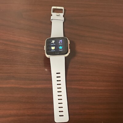 Fitbit Versa Smartwatch Fb504 Silver Case/Small Light Blue Band No Charger