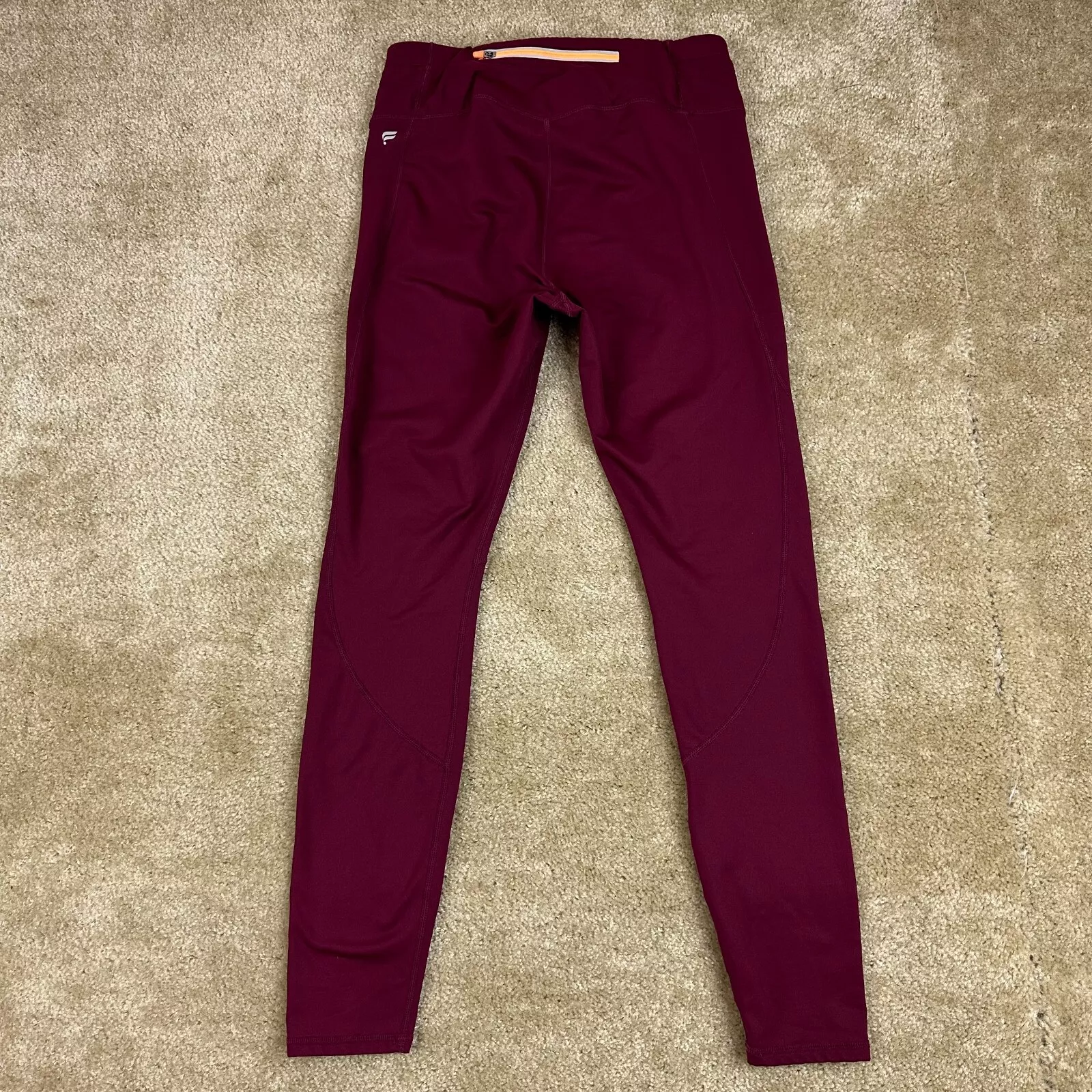 fabletics cold weather mid rise statement zip pocket leggings