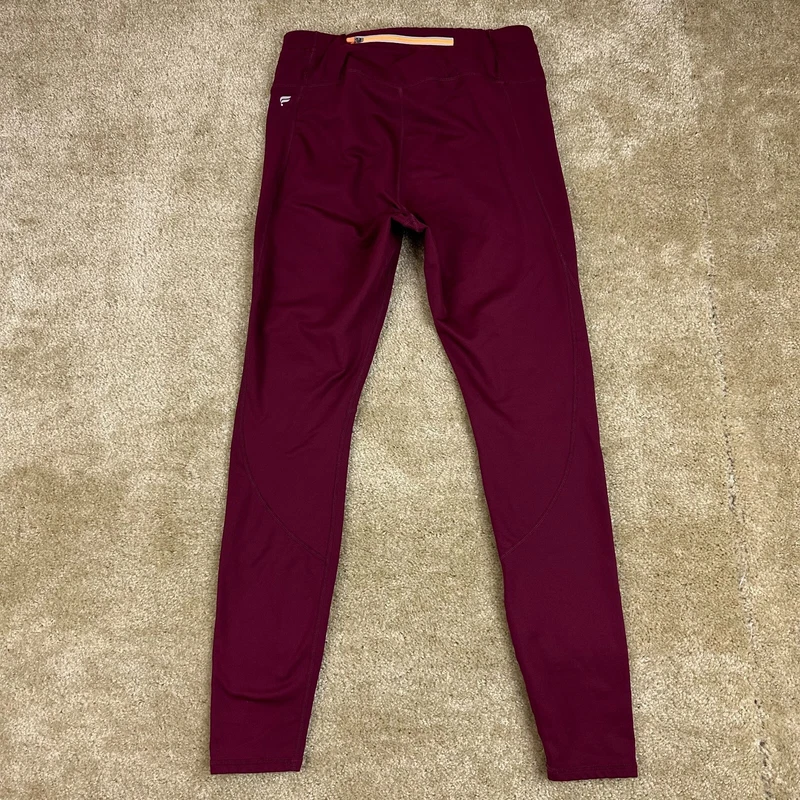 fabletics cold weather mid rise statement zip pocket leggings
