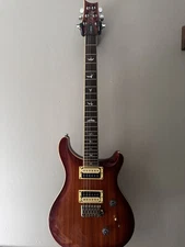 Prs Custom SE 24 Zebra Wood Orange Burst