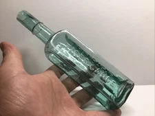 Antique Teal Colored Fletcher’s Tiger Sauce Bottle. 8 1/8 Inches Tall.