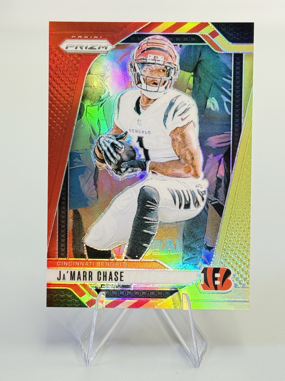 2024 Panini Prizm #57 Ja'Marr Chase Red And Yellow HoloParallel BENGALS /44