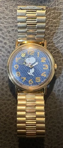 Vintage Timex Snoopy Tennis Watch Denim Mystery Dial, very nice w/gold tone band