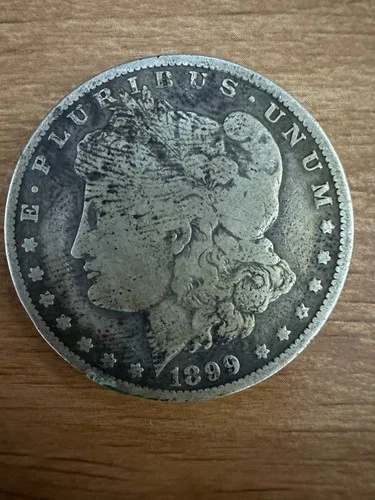 1899-O Morgan Silver Dollar $1 – VG/F Condition – 90% Silver – US Coin