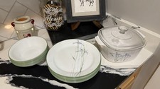 Corelle dinnerware set with a matching Corning Ware casserole in the Shadow Iris