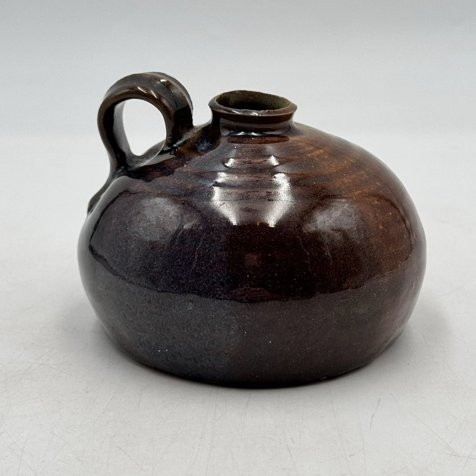 Candelabro en forma de jarra de gres de cerámica artística candelabro marrón lazo para dedos Foto 4 de 4