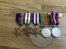 nice old lot 5 WW2 medal on a wearing bar 3 stars and 2 medals all in good shape