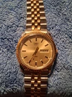 Timex Quartz Two-Tone Metal Bracelet Gold Dial Day/Date 35mm Vintage Dress