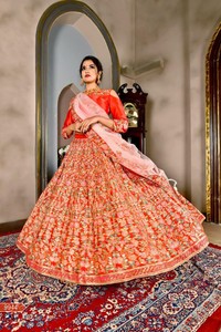 red bridal lehenga with golden dupatta