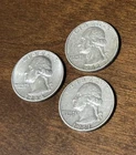 Lot of 3 silver quarters (1961, 1962, and 1964)