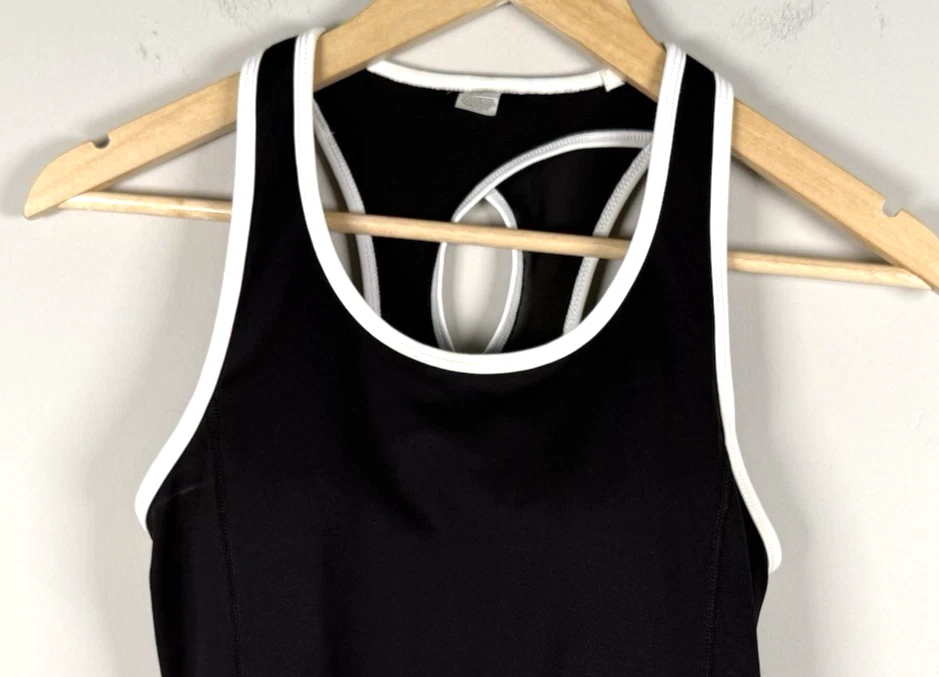 Prenda deportiva para mujer Fila talla pequeña negra estilo sin mangas acolchada atletismo tenis Foto 2 de 4