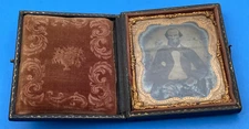 c.1857–62 Sixth-Plate Ambrotype in Embossed Leather Case, Nonpareil Mat