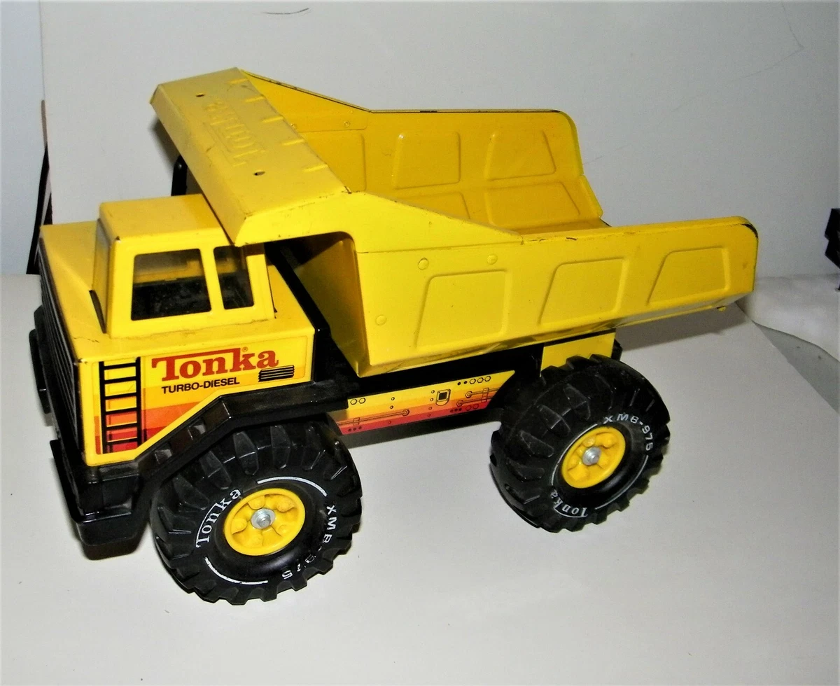 Vintage Mighty Tonka XMB 975 Pressed Steel Dump Truck Yellow Turbo Diesel. Nice