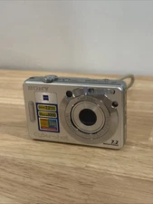 Sony Cyber-shot DSC-W55 7.2MP Compact Digital Camera Bundle Charger Battery