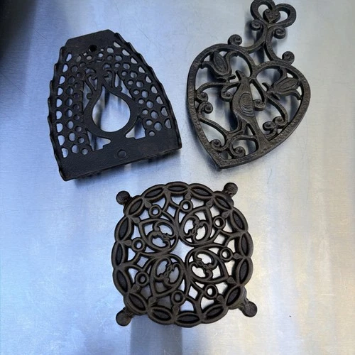 VINTAGE *SET OF 3* CAST IRON TRIVETS LACE BIRD SCROLL FLORAL - product listing photo