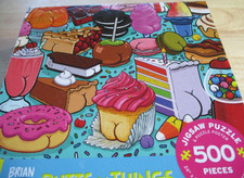 Ceaco 500 Piece Brian Cook Art Puzzle "Butts on Things" Food 18" x 24"