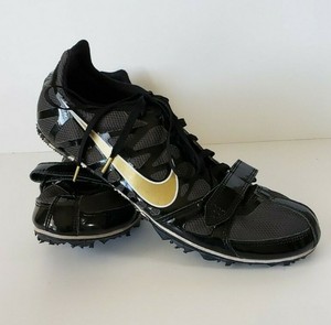 black and gold track shoes