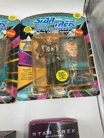 Star Trek Collectible Lot: 4 Action Figures, How To Host A Mystery Game & More