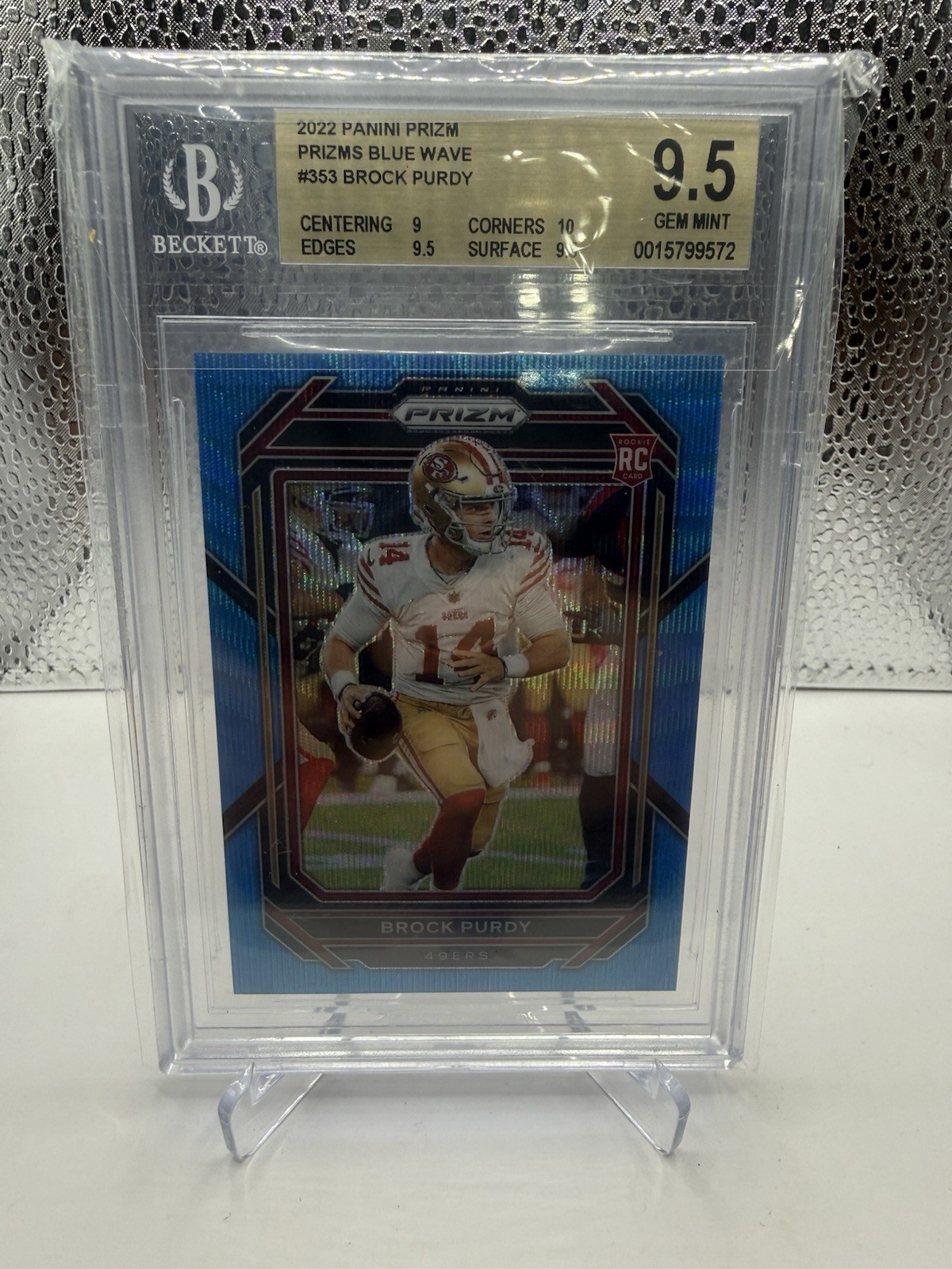 2022 Panini Prizm - Rookies Brock Purdy #353 Blue Wave Prizm /199 (RC)