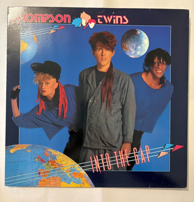 Thompson Twins - Into The Gap (12'' Vinyl LP, 1984) Arista 205 971 Black