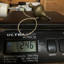 A Vintage Brass Plumb Bob with Steel Tip