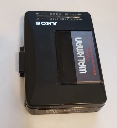 VINTAGE SONY WALKMAN AM FM RADIO CASSETTE PLAYER WM-F2015 RADIO WORKS