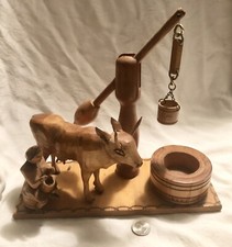 folkart carving milking the Cow with Working Well  Bucket