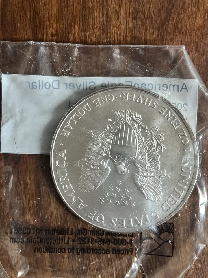 Lote de 4 dólares de plata American Eagle sin circular: 2000, 2003, 2006, 2008 Foto 4 de 4
