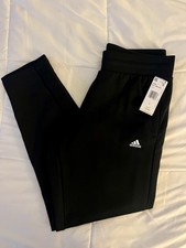 adidas Women  s Relaxed Fit Tapered Legs Fleece Pant, Black, L