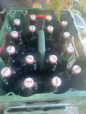 16 Grolsh Bottles and Case Very Good Condition