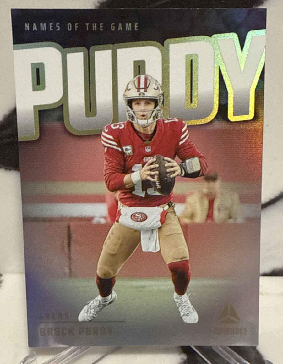 Brock Purdy 2024 Panini Luminance Names Of The Game SP Insert #NG-BPY SF 49ers