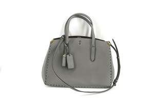 coach cooper carryall with rivets