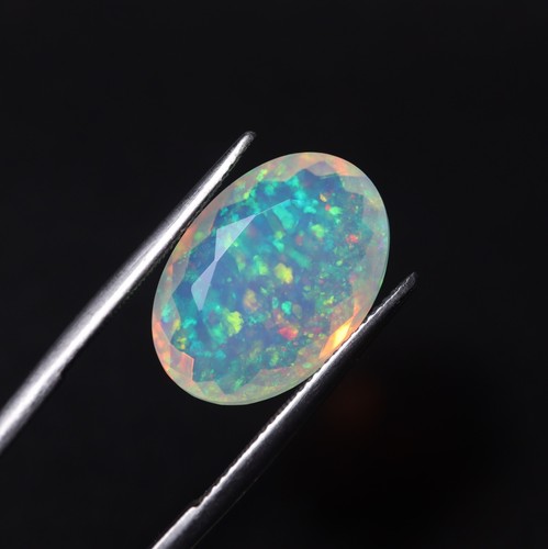 8.9 Carat Natural AAAA Rainbow Flashy Fire Ethiopian Opal Oval Cut 19.1x13.3 MM - Picture 7 of 11