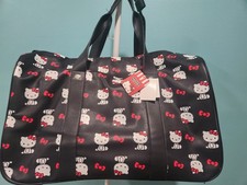 HELLO KITTY BIOWORLD ROLLING DUFFLE BAG LUGGAGE CARRY-ON SUITCASE NWT 20X10X11IN