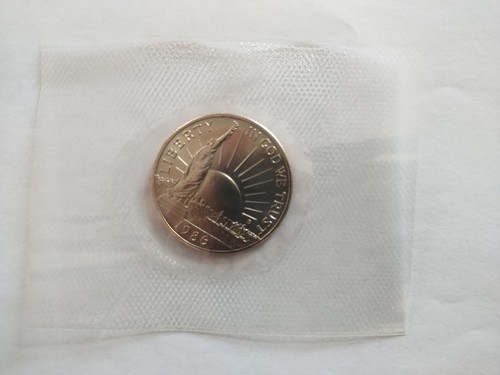 1986 Proof and Uncirculated Liberty Half Dollars - Picture 7 of 8