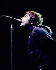 Liam Gallager performs with Oasis at the Fiddlers Green in Englewo- Old Photo