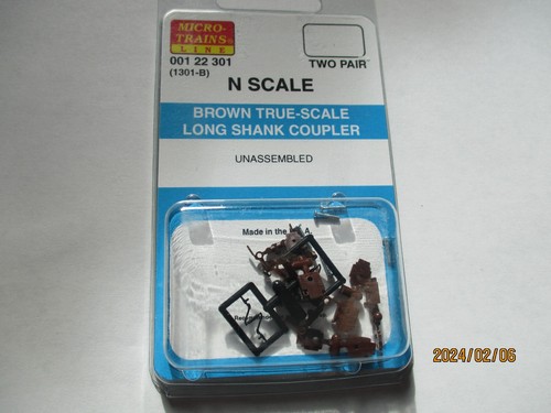 Micro-Trains Stock #00122301 Acoplador de vástago largo marrón escala verdadera (1301-B) (N) - Imagen 1 de 4
